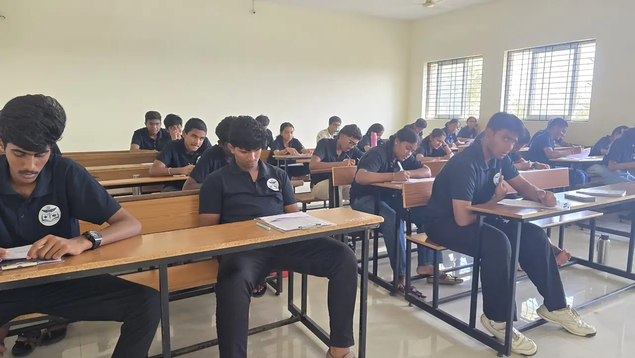 Boys working through their notes during a quiet study hour at RIMA