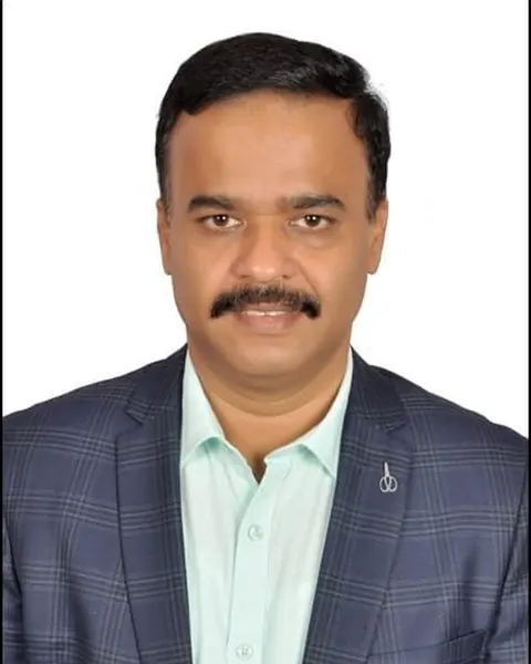 Portrait of Dr Ganesh P B, campus director, kodathi